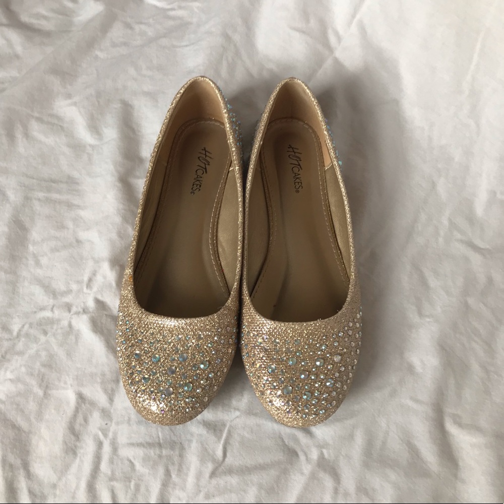 Woman’s gold sparkle shoes